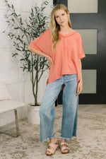Load image into Gallery viewer, Growing Restless V-Neck Tee in Coral
