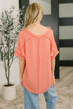 Load image into Gallery viewer, Growing Restless V-Neck Tee in Coral
