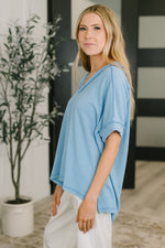 Load image into Gallery viewer, Growing Restless V-Neck Tee in Spring Blue
